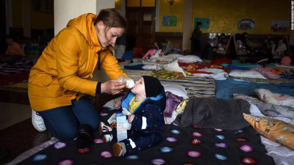 Nadiia Taratorina, 22, and her 6-month-old son Artem fled to the relative safety of the Carpathian Mountains, in early March